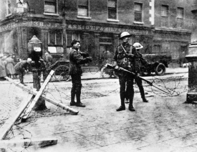 British troops man a road block outside Cassidy’s Grocery during the Easter Rising in Dublin, 1916