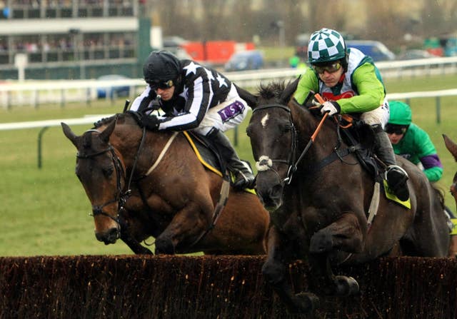 Imperial Commander (left) jumping upsides Denman in the 2010 Gold Cup