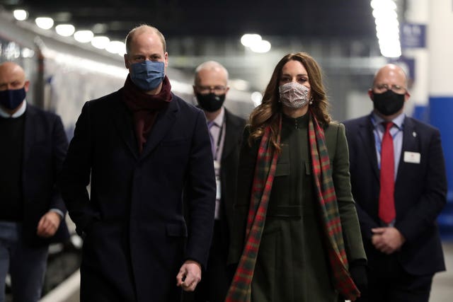 William and Kate walk along the platform before boarding the royal train. Chris Jackson/PA Wire