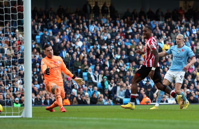 Ivan Toney struck twice for Brentford, including this stoppage-time winner, to seal his side a 2-1 win against Manchester City at the Etihad Stadium