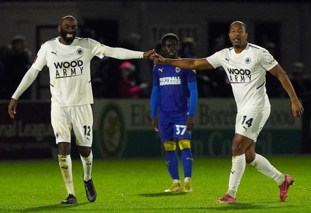 Boreham Wood’s Adrian Clifton (right) celebrates scoring