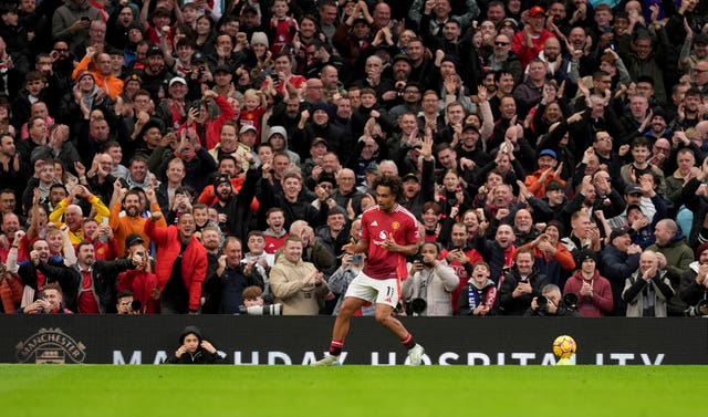 Joshua Zirkzee celebrates scoring his second goal against Everton