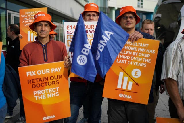 Members of the British Medical Association on the picket line outside a hospital in Birmingham