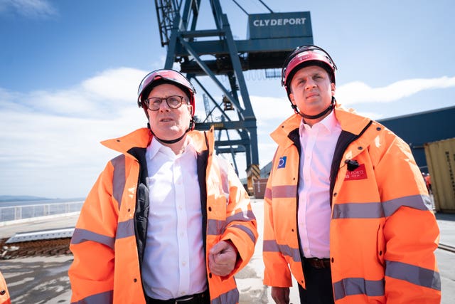 Anas Sarwar and Sir Keir Starmer dressed in hi-vis jackets and hard hats at the Port of Greenock