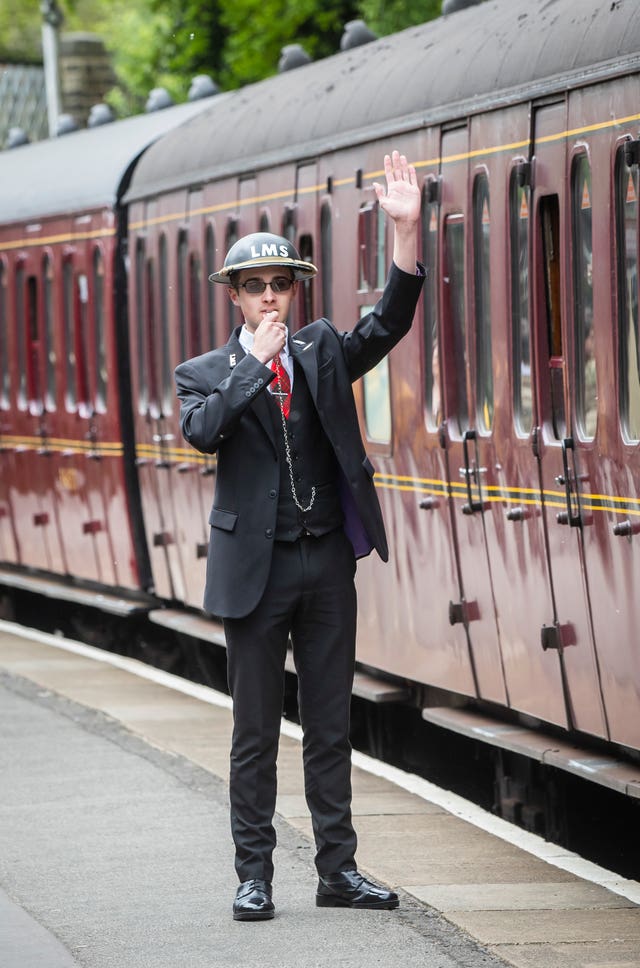 A train guard at Haworth train station during the Haworth 40s weekend