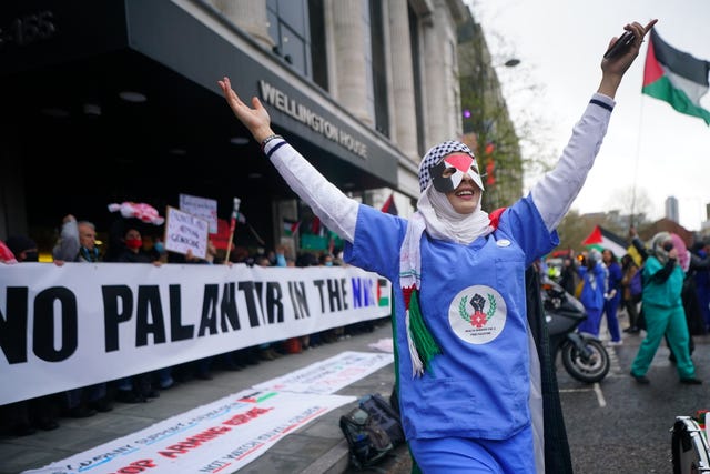 Protesters blockade the entrance to NHS England