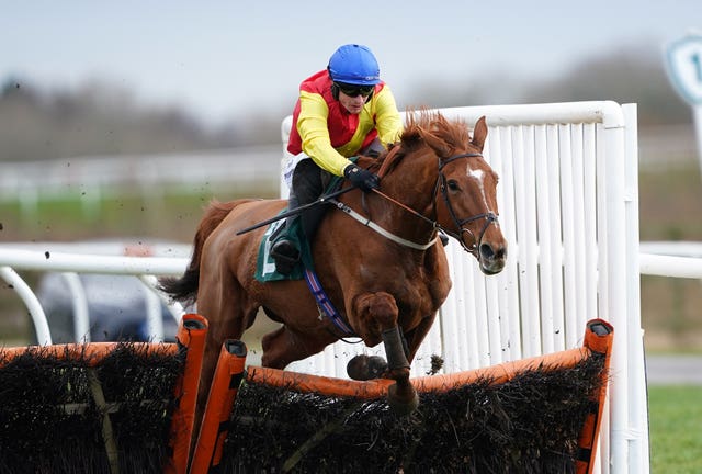 Miss Fairfax, ridden by Tom O’Brien, jumps the last well clear