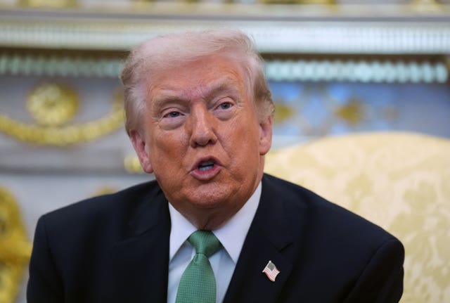 Head and shoulders photo of Donald Trump speaking