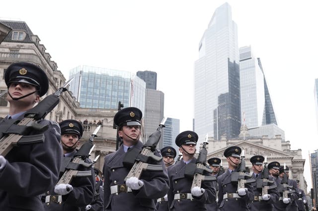 Military personnel take part in the Lord Mayor’s Show in the City of London