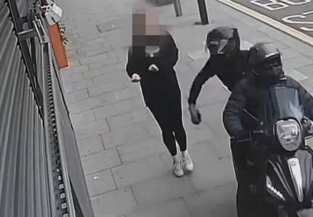 CCTV of a phone snatch from a moped in London