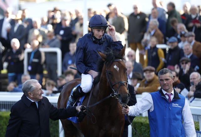 City Of Troy and Ryan Moore return to the winner's enclosure