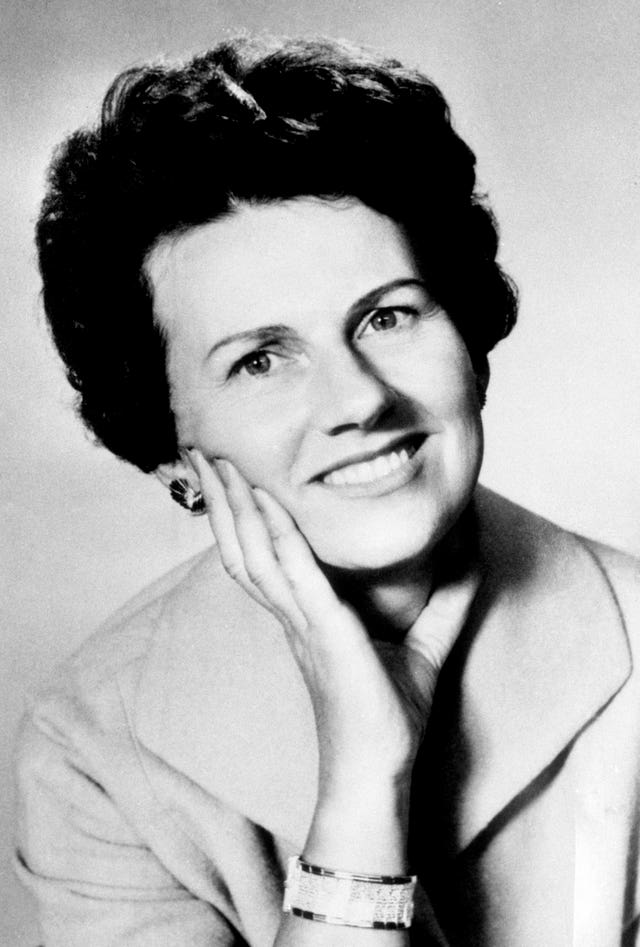 Black and white head and shoulders shot of a woman