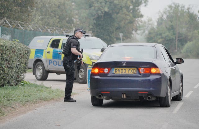 An armed police at a checkpoint near RAF Fairford in Gloucestershire. 