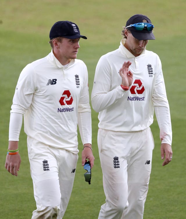 Bess (left) has discussed his experience with Test captain Joe Root (right).