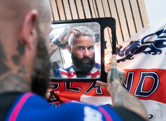 Shaun Garvey checks out his free “Phil Foden” hair cut that would normally cost �100, at Simon Townley hair salon in Burnley, Lancashire, who are offering free hair cuts in the styles of England players, ahead of the UEFA Euro 2020 Final on Sunday