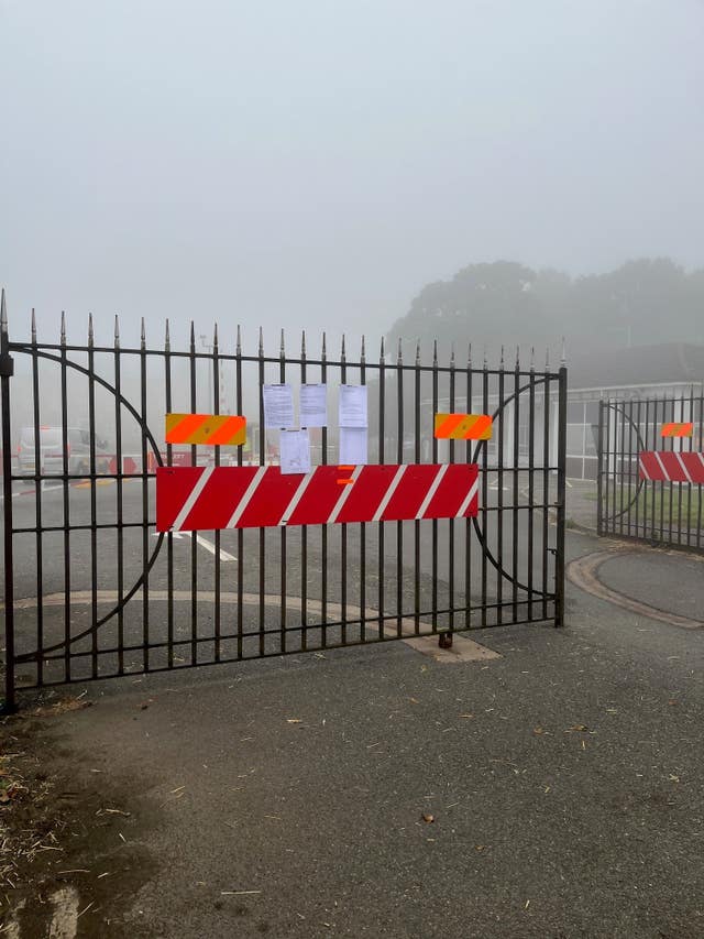 A temporary stop notice on the gates of RAF Scampton in Lincolnshire (West Lindsey District Council/PA)