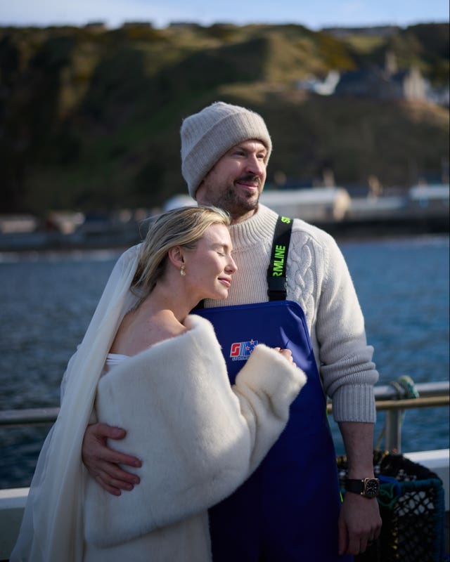 BrewDog founder James Watt and TV personality Georgia Toffolo aboard his father’s lobster fishing boat on Saturday at Gardenstown, Aberdeenshire, the small fishing village where James grew up, before their wedding ceremony