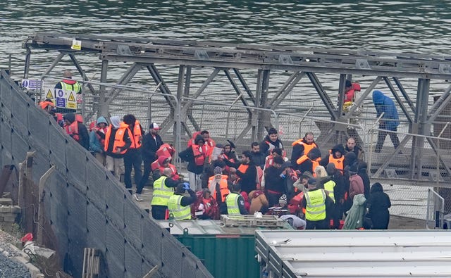 A group of people thought to be migrants are brought in to Dover from a Border Force vessel