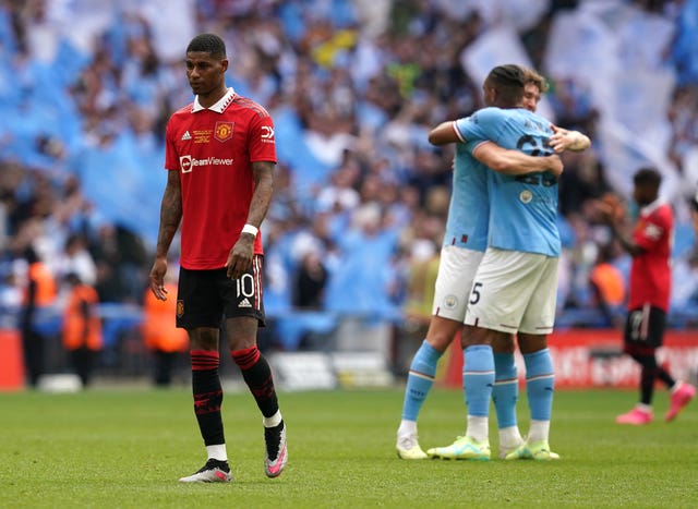 Marcus Rashford is dejected after Manchester United lose the FA Cup final