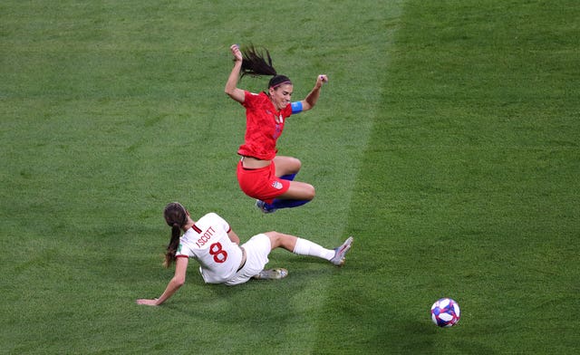 England's Jill Scott challenges Alex Morgan