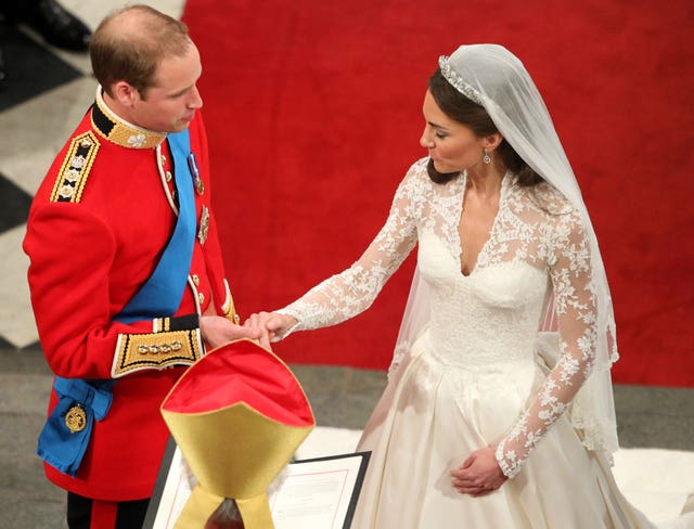 Prince William and Kate Middleton at the altar during their wedding ceremony in Westminster Abbey (Andrew Milligan/PA)
