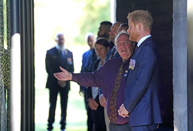 The Duke of Sussex views the Australian War Memorial with Indigenous veteran Michael Bell