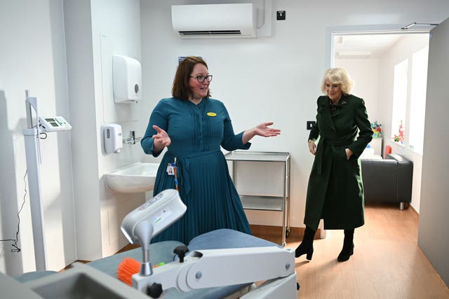 Queen Camilla is shown a child’s examination room by paediatric doctor Hannah Law