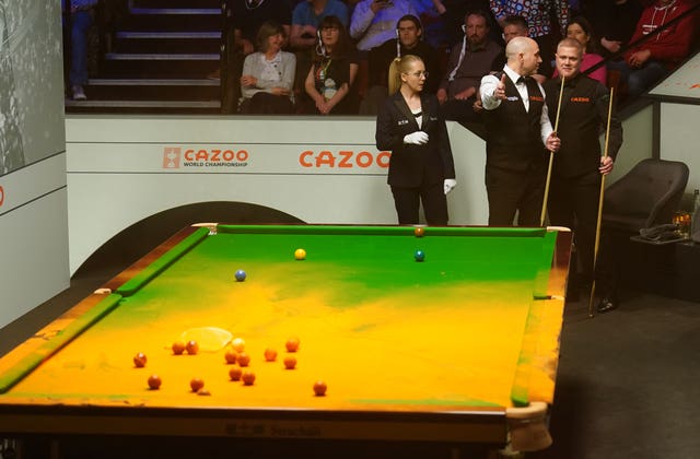 Orange powder on the table after a Just Stop Oil protester jumped on it during a match between Robert Milkins against Joe Perry at the Crucible
