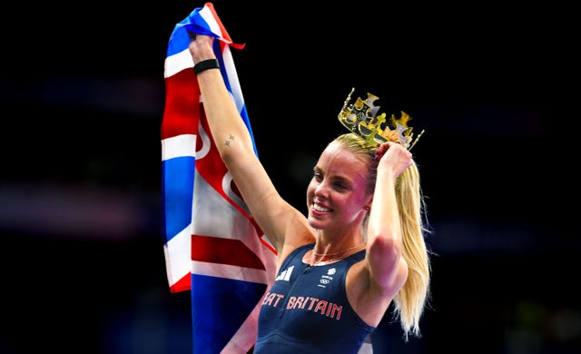 Keely Hodgkinson holds a crown and British flag