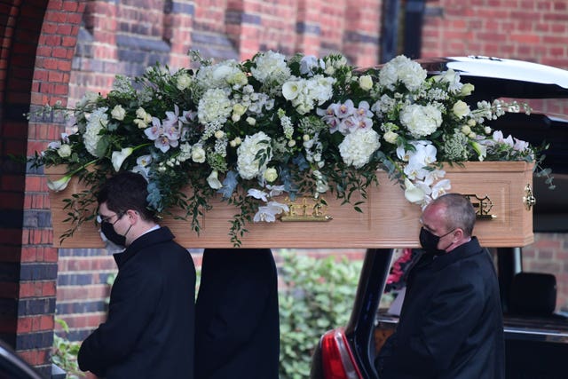 Dame Barbara Windsor’s coffin is carried into Golders Green Crematorium, north London, ahead of a private ceremony 