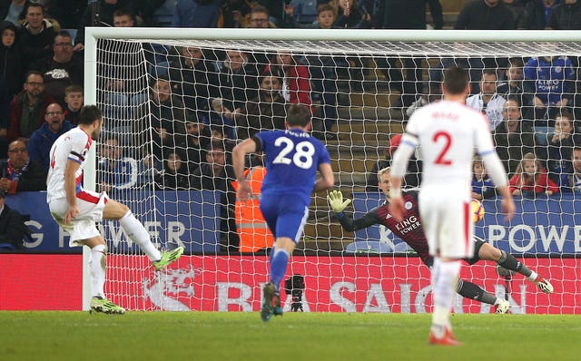 Luka Milivojevic, left, scores Crystal Palace's third goal against Leicester