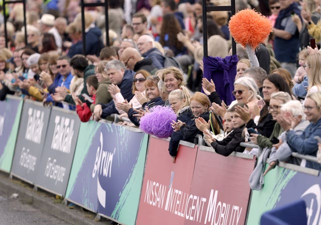 Spectators support athletes over the finish line during the Great North Run