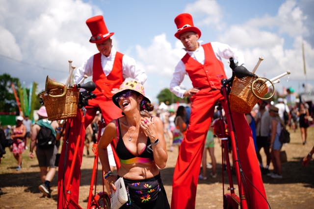 Stilt-walkers in the circus area of the festival