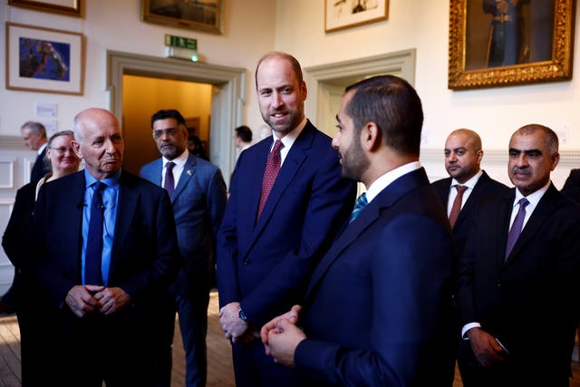 William (centre) and Theyazin bin Haitham listen to British explorer Mark Evans (left) 