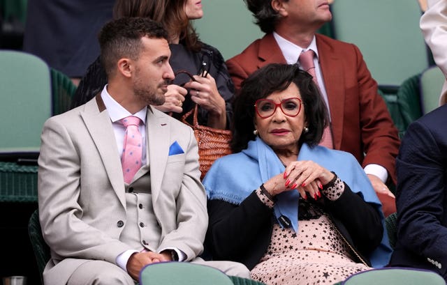 Dame Shirley Bassey watching tennis at Wimbledon