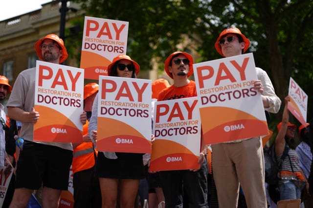 Junior doctors protest outside Downing Street, London.