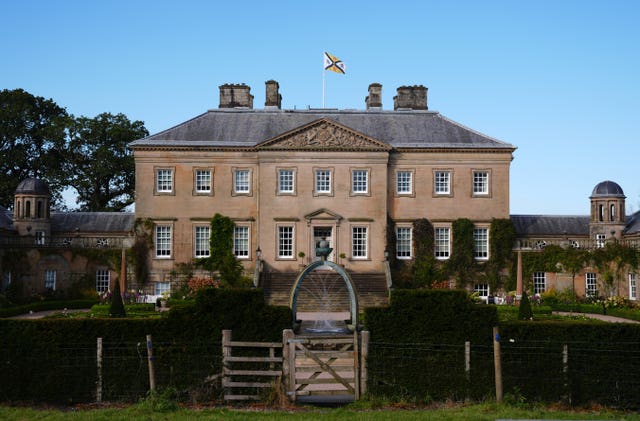 Exterior view of Dumfries House under blue sky