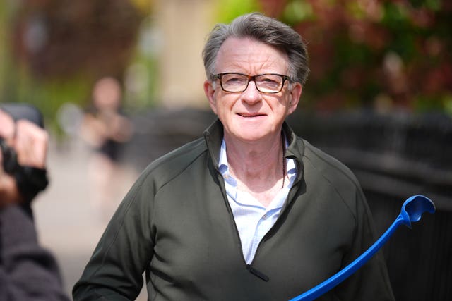 Peter Mandelson taking his dog for a walk