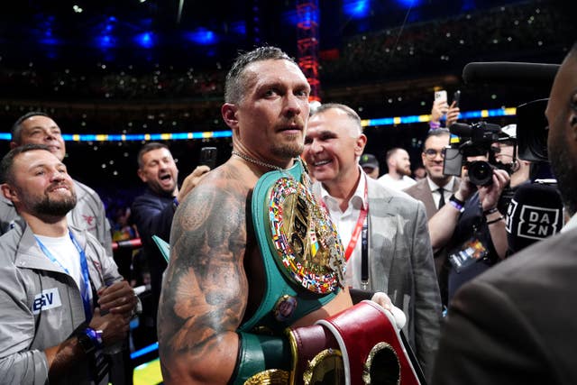 Oleksandr Usyk with his belts