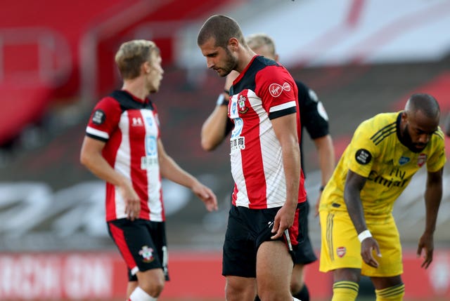 Jack Stephens walks off after being shown a red card