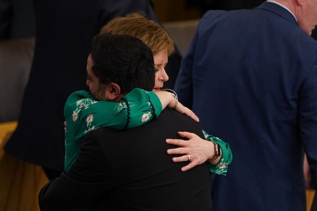 Humza Yousaf and Nicola Sturgeon hugging