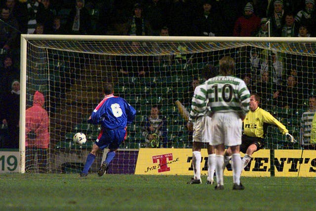 Paul Sherrin (left) scores as Inverness shock Celtic with a 3-1 win in the Scottish Cup - it would be Barnes' last game in charge.