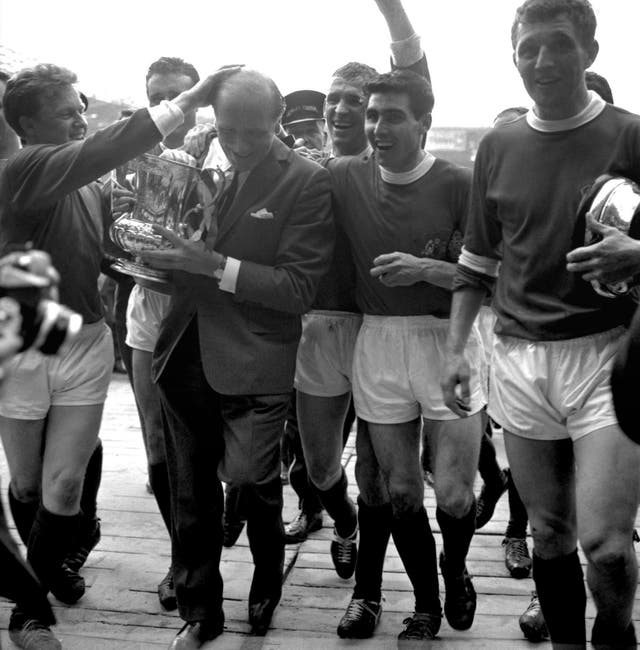 Tony Dunne (second right) enjoyed a glittering career under Sir Matt Busby