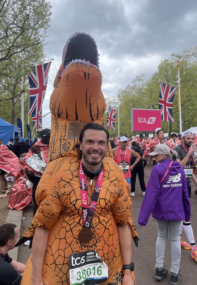 Lee Baynton after finishing the TCS London Marathon dressed in an inflatable costume 