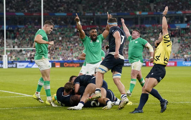 Hugo Keenan (hidden) scored Ireland’s fourth try as they produced another clinical display to beat Scotland 36-14 in Paris