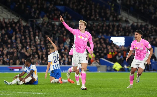 Southampton’s Flynn Downes, centre, celebrates his equaliser against Brighton