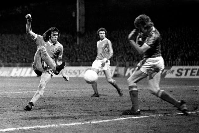 Dave Watson, left, in action for Manchester City against Nottingham Forest