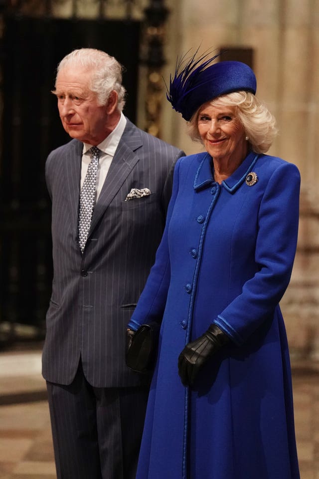 The King and the Queen Consort arrive for the service 