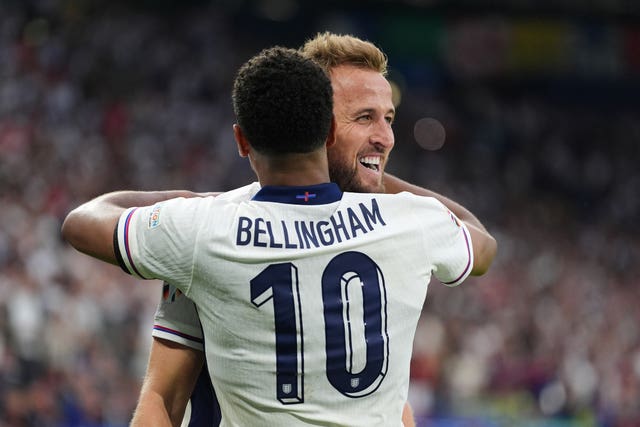 England’s Harry Kane celebrates with Jude Bellingham after scoring the winning goal against Slovakia