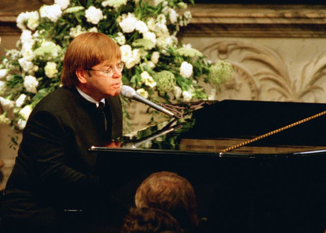 Elton John performing at Diana's funeral
